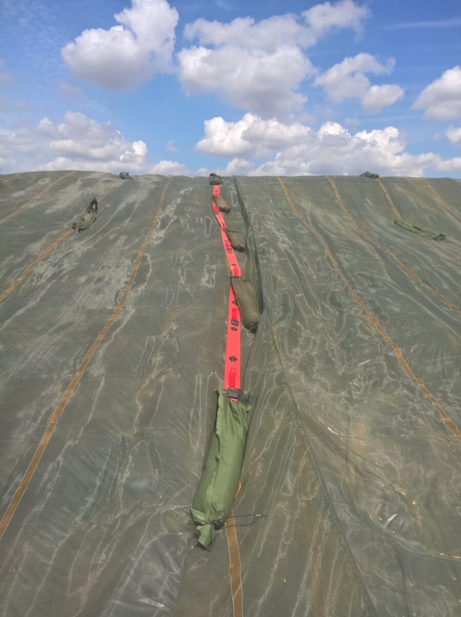 Gravel bag belts make covering silage clamps simpler and safer